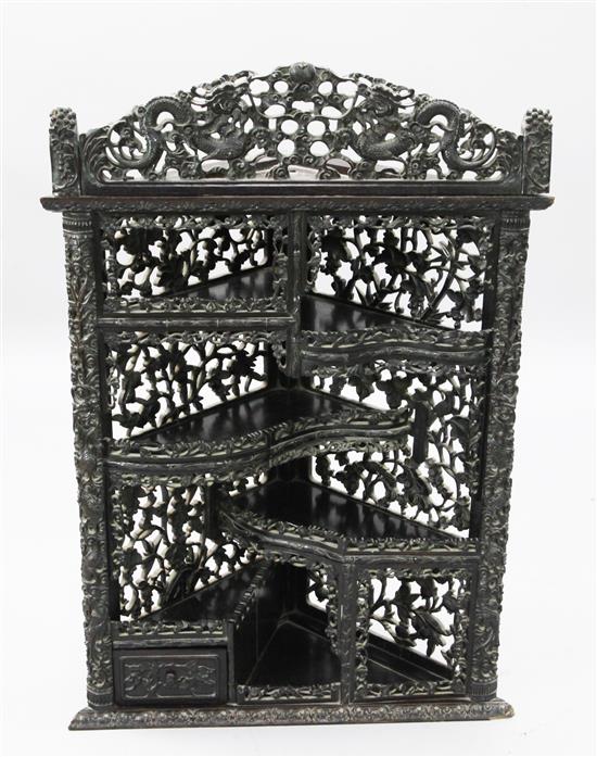 A Chinese hongmu hanging corner cabinet, late 19th century, W.66cm H.109cm